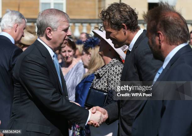 Prince Andrew, Duke of York meets James Cracknell and Martin Roberts at the Royal Society for the Prevention of Accidents Centenary Garden Party on...