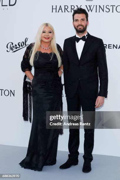 Monika Bacardi and Andrea Iervolino arrive at the amfAR Gala Cannes 2017 at Hotel du Cap-Eden-Roc on May 25, 2017 in Cap d'Antibes, France.