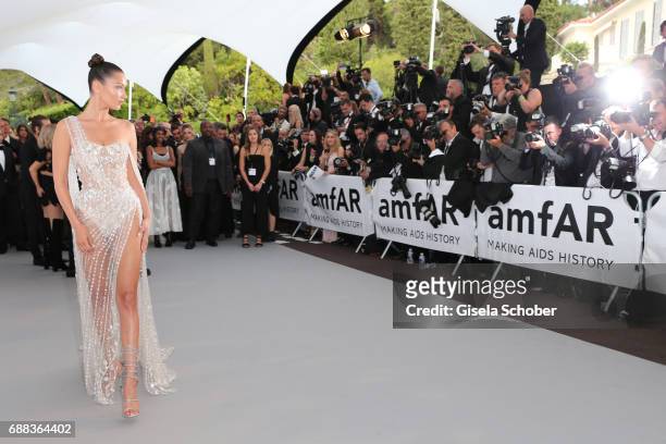 Bella Hadid arrives at the amfAR Gala Cannes 2017 at Hotel du Cap-Eden-Roc on May 25, 2017 in Cap d'Antibes, France.