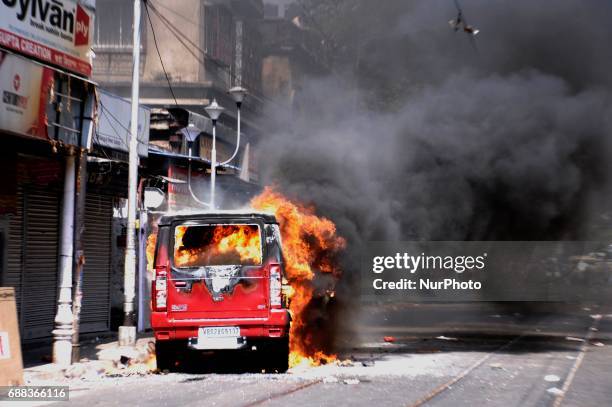 Bharatiya Janata Party activists set fire on police jeep during their march to the police headquarters in Kolkata, India on Thursday, 25th May,2017....
