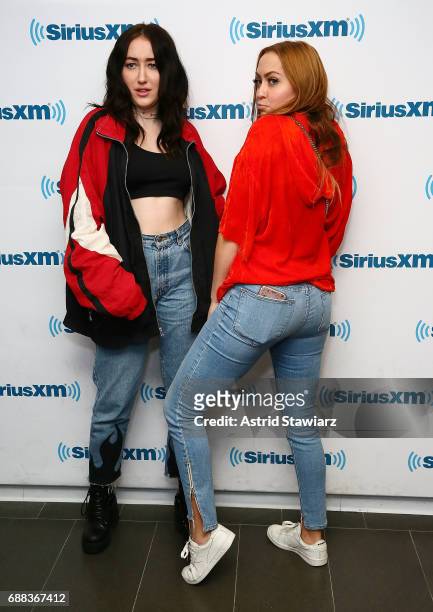 Singer Noah Cyrus and actress Brandi Cyrus visit the SiriusXM Studios on May 25, 2017 in New York City.