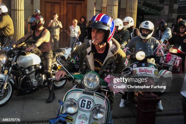 Scooter riders and members of motorcycle clubs arrive at St Ann's Square to pay their respects to the victims of who died in Monday's terror attack...