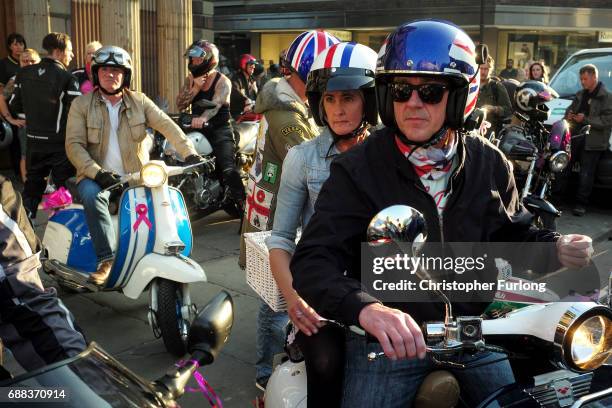 Scooter riders and members of motorcycle clubs arrive at St Ann's Square to pay their respects to the victims of who died in Monday's terror attack...