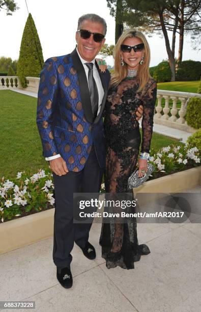 Steve Varsano and Lisa Tchenguiz arrive at the amfAR Gala Cannes 2017 at Hotel du Cap-Eden-Roc on May 25, 2017 in Cap d'Antibes, France.