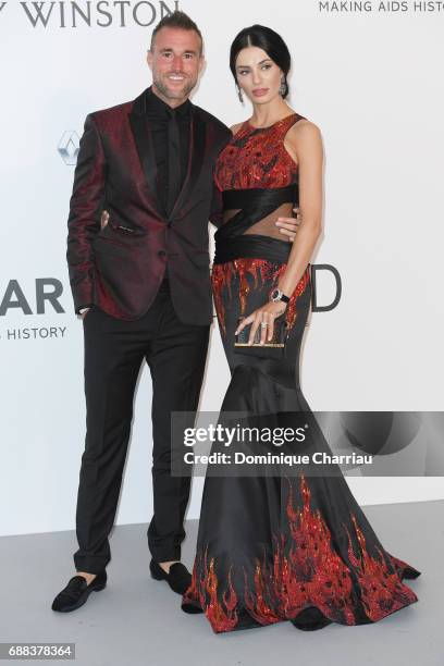 Philipp Plein and Andreea Sasu arrive at the amfAR Gala Cannes 2017 at Hotel du Cap-Eden-Roc on May 25, 2017 in Cap d'Antibes, France.