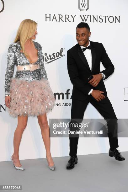 Lara Stone and Sunnery James arrive at the amfAR Gala Cannes 2017 at Hotel du Cap-Eden-Roc on May 25, 2017 in Cap d'Antibes, France.