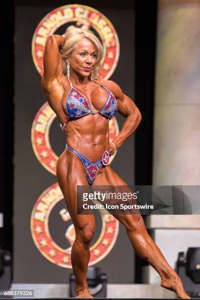Lenore Gregson competes in Women's Physique International as part of the Arnold Sports Festival on March 3 at the Greater Columbus Convention Center...