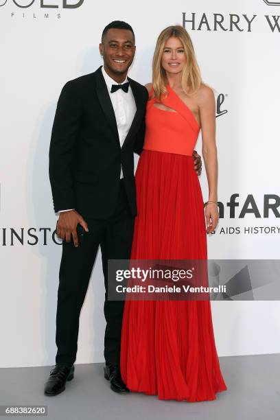 Doutzen Kroes and Sunnery James arrive at the amfAR Gala Cannes 2017 at Hotel du Cap-Eden-Roc on May 25, 2017 in Cap d'Antibes, France.