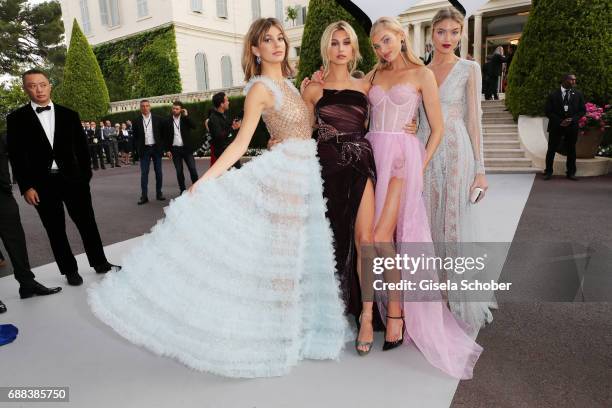 Camila Morrone, Hailey Baldwin, Elsa Hosk and Martha Hunt arrive at the amfAR Gala Cannes 2017 at Hotel du Cap-Eden-Roc on May 25, 2017 in Cap...
