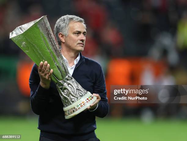 Manager Jose Mourinho of Manchester United celebrates with the Europa League trophy after the UEFA Europa League Final match between Manchester...