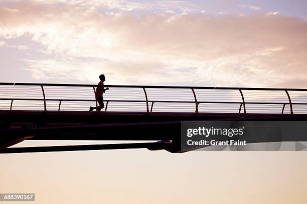 bridge crossing. - footbridge stock pictures, royalty-free photos & images