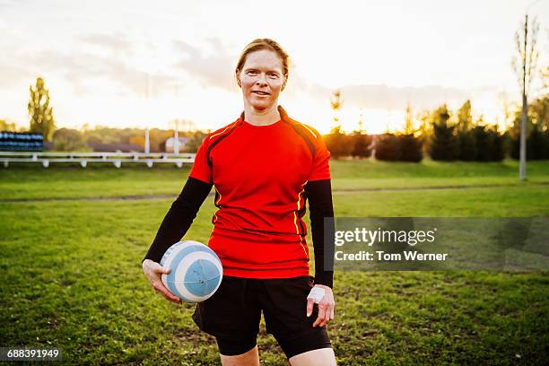 portrait of a female rugby player - rugby portraits stock-fotos und bilder