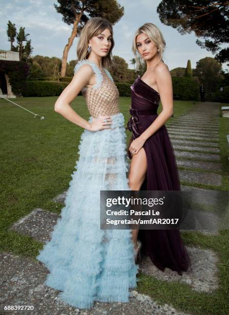 Camilla Morrone and Hailey Baldwin attend the amfAR Gala Cannes 2017 at Hotel du Cap-Eden-Roc on May 25, 2017 in Cap d'Antibes, France.