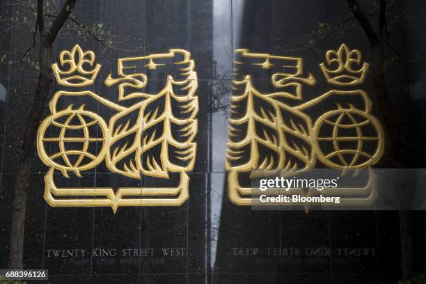 The Royal Bank of Canada logo is reflected on a surface in Toronto, Ontario, Canada, on Friday, May 19, 2017. Ontario is easing rules for its pension...