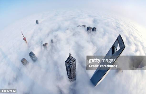 shanghai skyline in the thick fog, china - cloudscape buildings stock pictures, royalty-free photos & images