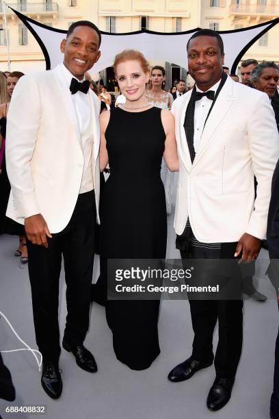 Will Smith, Jessica Chastain and Chris Tucker attend the amfAR Gala Cannes 2017 at Hotel du Cap-Eden-Roc on May 25, 2017 in Cap d'Antibes, France.