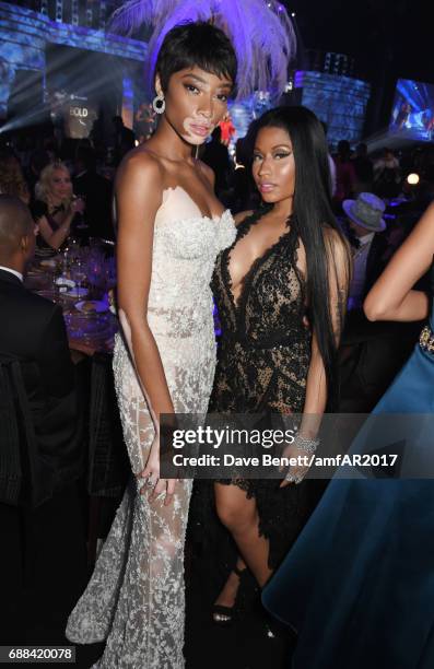 Winnie Harlow and Nicki Minaj attend the amfAR Gala Cannes 2017 at Hotel du Cap-Eden-Roc on May 25, 2017 in Cap d'Antibes, France.