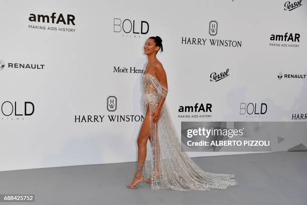 Model Bella Hadid poses as she arrives for the amfAR's 24th Cinema Against AIDS Gala on May 25, 2017 at the Hotel du Cap-Eden-Roc in Cap d'Antibes,...