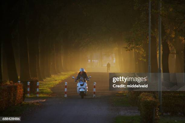 on the way - moped stock pictures, royalty-free photos & images