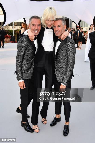 Dan Caten, Marjan Jonkman and Dean Caten attend the amfAR Gala Cannes 2017 at Hotel du Cap-Eden-Roc on May 25, 2017 in Cap d'Antibes, France.