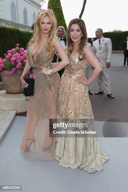 Audrey Tritto and guest arrive at the amfAR Gala Cannes 2017 at Hotel du Cap-Eden-Roc on May 25, 2017 in Cap d'Antibes, France.