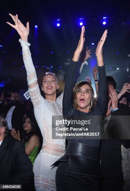 Bella Hadid and Carine Roitfeld attend the amfAR Gala Cannes 2017 at Hotel du Cap-Eden-Roc on May 25, 2017 in Cap d'Antibes, France.