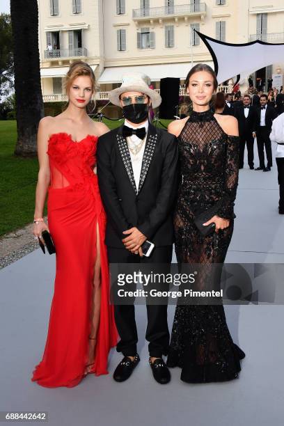 Nadine Leopold, Alec Monopoly and Lara Lieto arrive at the amfAR Gala Cannes 2017 at Hotel du Cap-Eden-Roc on May 25, 2017 in Cap d'Antibes, France.