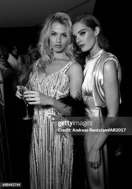 Hailey Clauson and Alexina Graham attend the amfAR Gala Cannes 2017 at Hotel du Cap-Eden-Roc on May 25, 2017 in Cap d'Antibes, France.