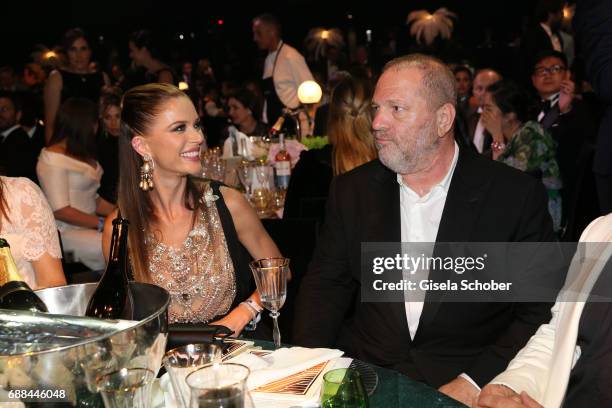 Georgina Chapman and Harvey Weinstein attend the amfAR Gala Cannes 2017 at Hotel du Cap-Eden-Roc on May 25, 2017 in Cap d'Antibes, France.