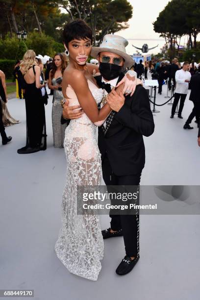 Winnie Harlow and Alec Monopoly attend the amfAR Gala Cannes 2017 at Hotel du Cap-Eden-Roc on May 25, 2017 in Cap d'Antibes, France.