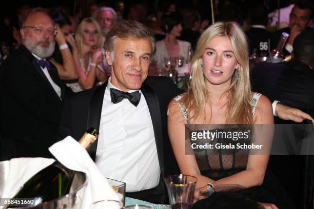 Christoph Waltz and Camille Charriere attend the amfAR Gala Cannes 2017 at Hotel du Cap-Eden-Roc on May 25, 2017 in Cap d'Antibes, France.