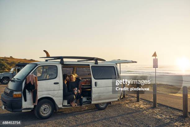 it's amazing out here, and even better with you - couple in car smiling stock pictures, royalty-free photos & images