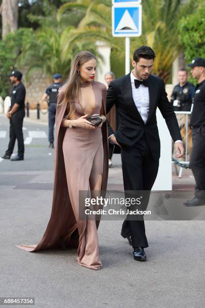 Xenia Tchoumi and Baptiste Giabiconi at the amfAR Gala Cannes 2017 at Hotel du Cap-Eden-Roc on May 25, 2017 in Cap d'Antibes, France.