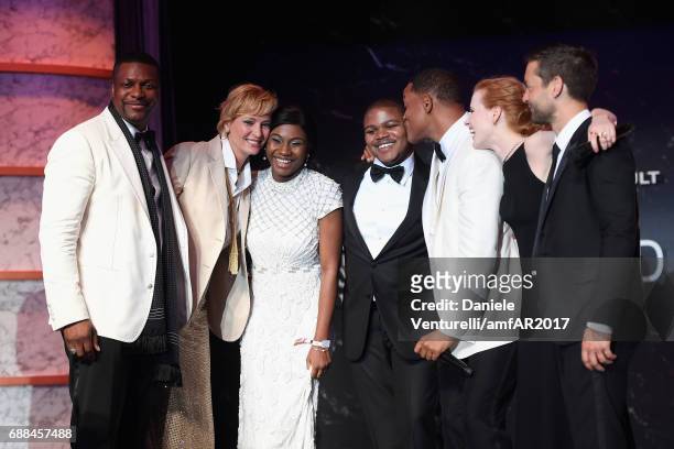 Chris Tucker, Uma Thurman, winners of the auction, Willl Smith, Jessica Chastain and Tobey Maguire on stage at the amfAR Gala Cannes 2017 at Hotel du...