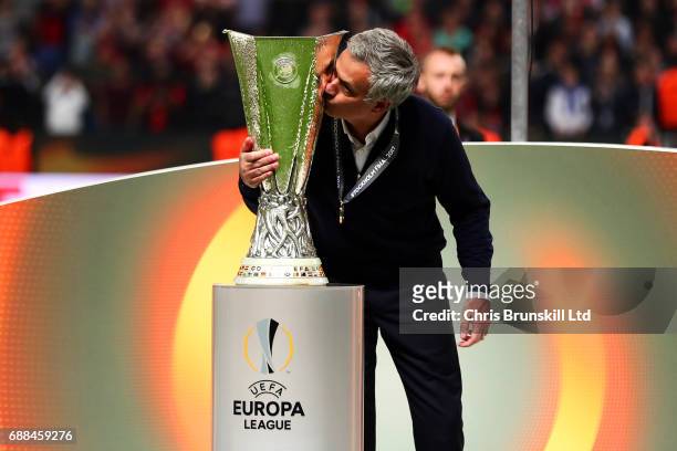 Manchester United manager Jose Mourinho kisses the trophy following the UEFA Europa League Final match between Ajax and Manchester United at Friends...