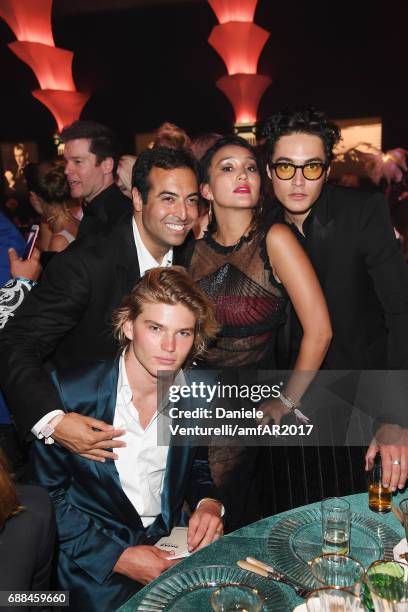 Jordan Barrett, Mohammed Al Turki and guests attend the amfAR Gala Cannes 2017 at Hotel du Cap-Eden-Roc on May 25, 2017 in Cap d'Antibes, France.