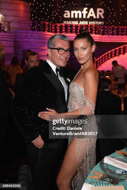 Giorgio Guidotti and Bella Hadid attend the amfAR Gala Cannes 2017 at Hotel du Cap-Eden-Roc on May 25, 2017 in Cap d'Antibes, France.