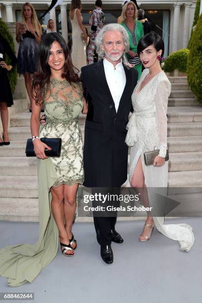 Rabea Rahimi, Vice-Chairman of amfAR Hermann Buehlbecker, and Paz Vega arrive at the amfAR Gala Cannes 2017 at Hotel du Cap-Eden-Roc on May 25, 2017...