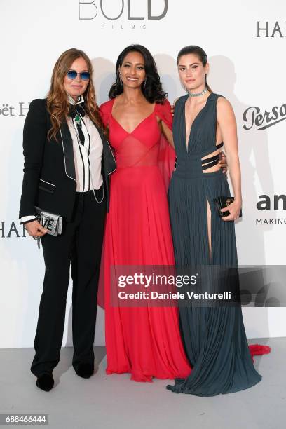 Eva Cavalli, Rula Jebreal and guest arrive at the amfAR Gala Cannes 2017 at Hotel du Cap-Eden-Roc on May 25, 2017 in Cap d'Antibes, France.