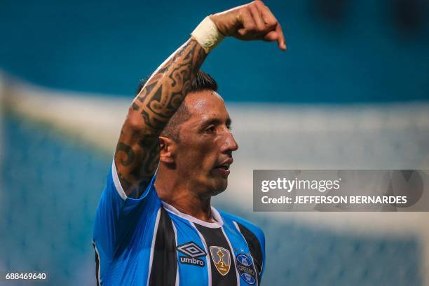 Lucas Barrios of Gremio celebrates after scoring against Venezuela's Zamora during their Copa Libertadores football match at the Arena do Gremio...