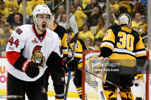 Jean-Gabriel Pageau of the Ottawa Senators celebrates after teammate Mark Stone scored a goal against Matt Murray of the Pittsburgh Penguins during...