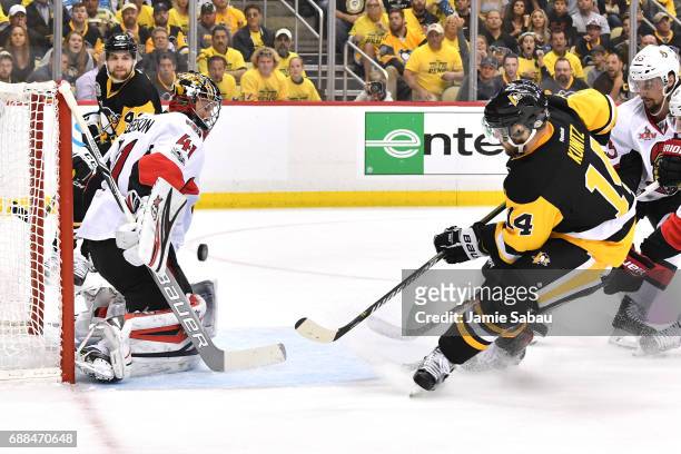 Chris Kunitz of the Pittsburgh Penguins scores a goal against Craig Anderson of the Ottawa Senators during the second period in Game Seven of the...