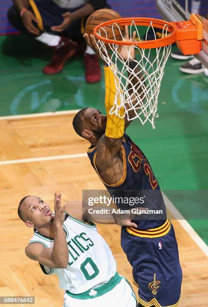 LeBron James of the Cleveland Cavaliers shoots the ball against Avery Bradley of the Boston Celtics in the first half during Game Five of the 2017...