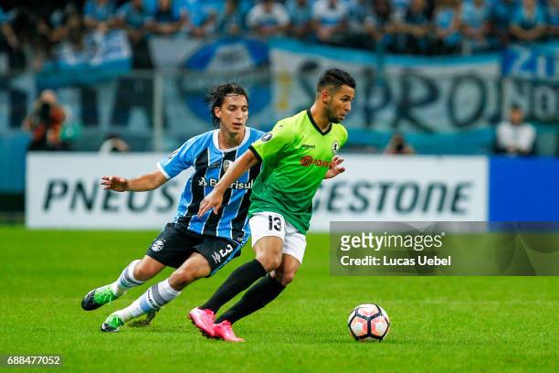 Pedro Geromel of Gremio battles for the ball against Cesar Martinez of Zamora during the match Gremio v Zamora as part of Copa Bridgestone...