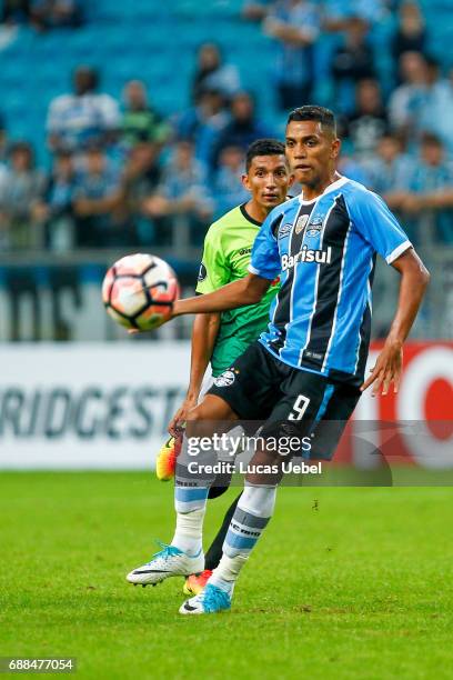 Pedro Rocha of Gremio battles for the ball against Jose Pinto of Zamora during the match Gremio v Zamora as part of Copa Bridgestone Libertadores...