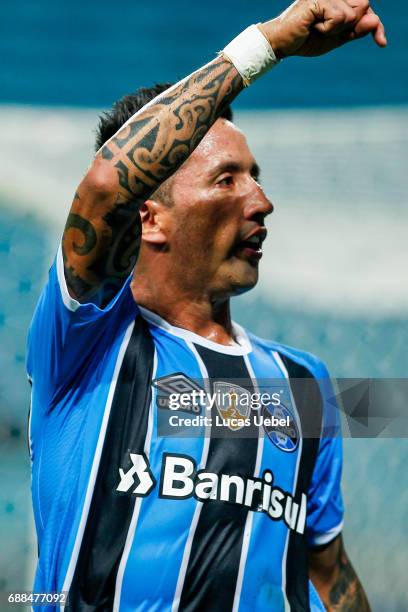 Lucas Barrios of Gremio celebrates their second goal during the match Gremio v Zamora as part of Copa Bridgestone Libertadores 2017, at Arena do...