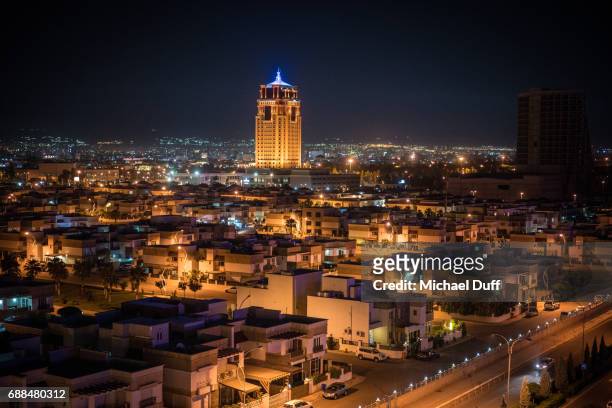 erbil, iraq at night - iraq stock pictures, royalty-free photos & images