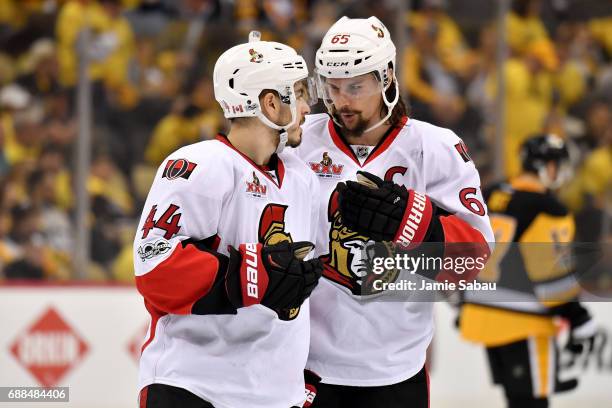 Jean-Gabriel Pageau and Erik Karlsson of the Ottawa Senators talk during a break in play against the Pittsburgh Penguins in Game Seven of the Eastern...