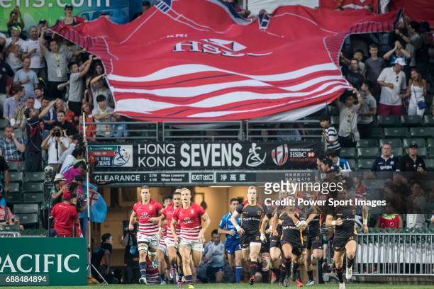 Players of Germany and Hong Kong teams enter the pitch during their World Rugby Sevens Series Qualifier match between Germany and Hong Kong as part...