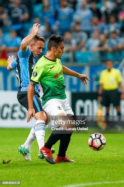 Arthur of Gremio battles for the ball against Diego Garcia of Zamora during the match Gremio v Zamora as part of Copa Bridgestone Libertadores 2017,...